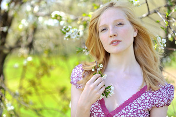 Fototapeta premium Portrait of a cute natural girl outdoors