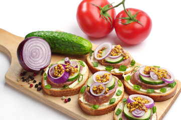 Sandwiches with sausage and onion