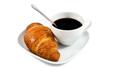 breakfast with cup of black coffee and croissant