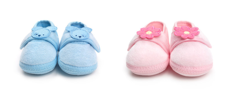 Two Pairs Of Baby Boy And Girl Shoes