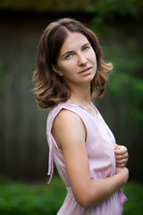 Naklejka premium Young beautiful caucasian woman takes rest in park