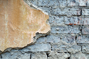background of brick and plaster
