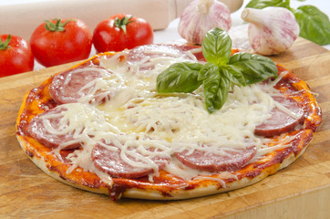 italian pizza with salami and cheese