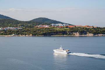 White and Blue Ferry in Croatia Bay