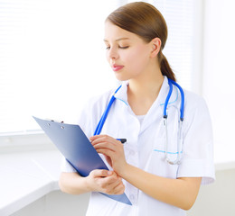 Female doctor with notepad