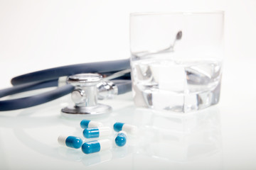 Some pills and stethoscope