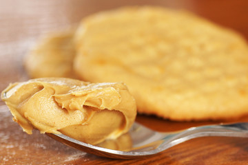 Spoon with peanut butter