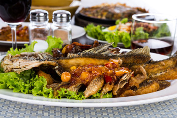 Fried fish with spicy sauce