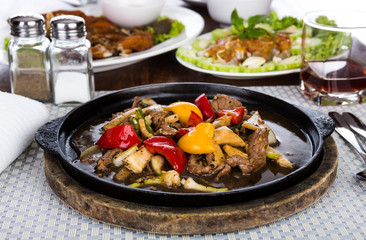 Deer fried  served on iron hot plate