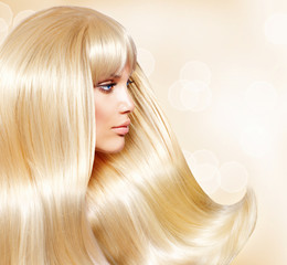 Blond Hair. Fashion Girl With Healthy Long Smooth Hair