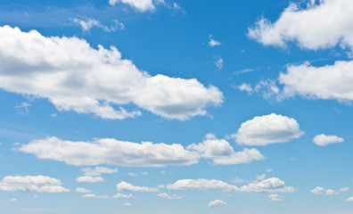 Beautiful blue sky with fluffy clouds