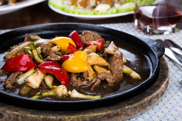 Deer fried  served on iron hot plate