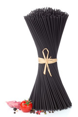 Italian food  - black spaghetti, tomato, garlic and pepper