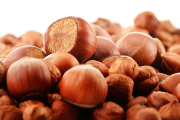 Fototapeta premium Composition with hazelnuts isolated on white