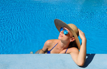 Woman at poolside