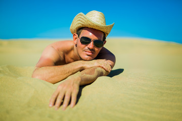 sexy young man at the beach