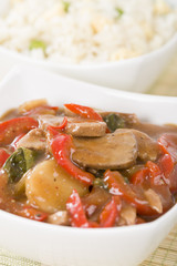 Chinese style pork with red peppers served with egg fried rice.