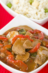 Chinese style pork with red peppers served with egg fried rice.