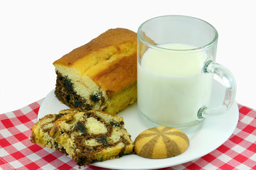 Milk with marble cake and cookies