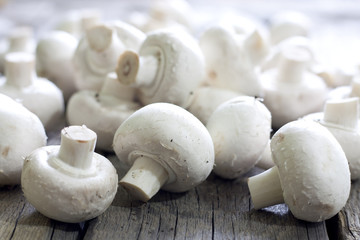 Champignon on wooden boards closeup