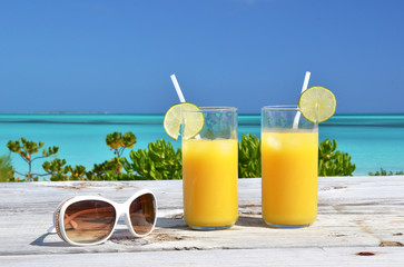 Sunglasses and orange juice