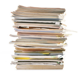 Stack of old magazines isolated on white. Paper recycling
