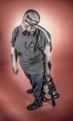 zombie with mechanical saw
