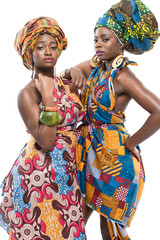 Two African fashion models on white background.