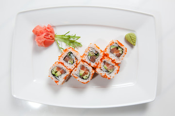 Maki Sushi on plate isolated on white