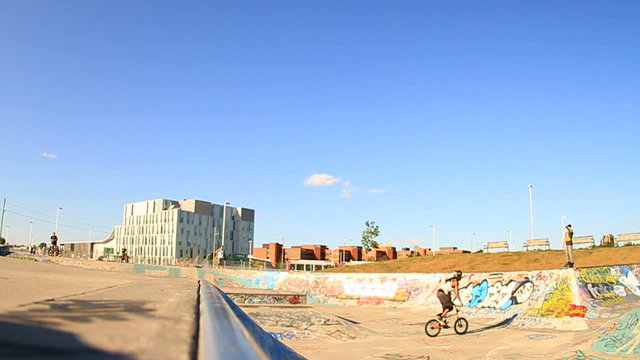 BMX Bike Rider Does Backflip In Skatepark