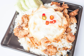 Egg fried and fried pork garlic with soy sauce topped on rice