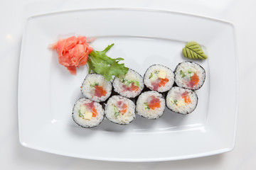 Maki Sushi on plate isolated on white