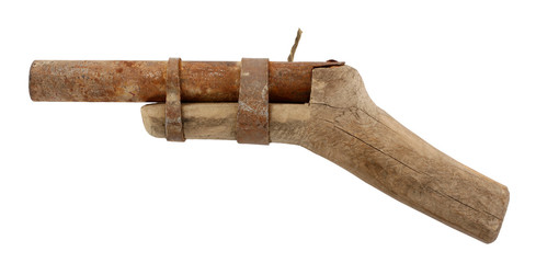 Old handmade pistol with wick