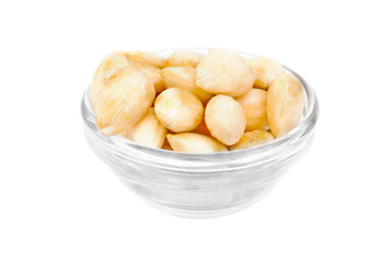 Dried  peeled almonds on glass bowl