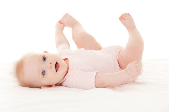 Cute baby with beautiful blue eyes on the white background