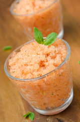 tomato sorbet with basil in a glass close-up