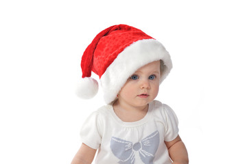 baby girl in Santa hat