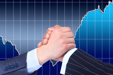 The conclusion of the transaction. Handshake.