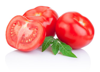 Two Juicy Red tomatoes and half with leaves Isolated on white ba