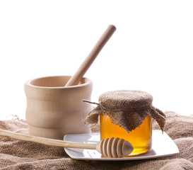 honey in glass with drizzler