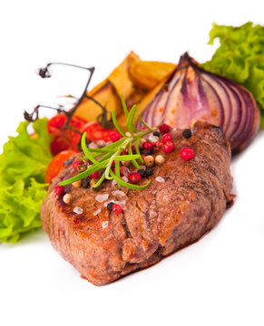 Grilled steak isolated on white background