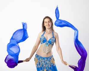woman with curves dancing an oriental dance belly dancer