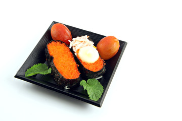 Sushi made ​​from seafood and Place the tomatoes on the side