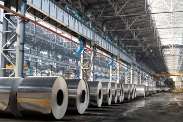 Foto op Aluminium Long row of rolls of aluminum in production shop of plant. © Pavel Losevsky