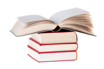 Blanc Book open on tree red books