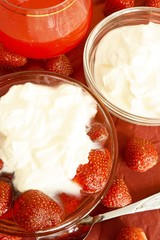 Strawberries in syrup and sour cream.