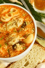 Soup with dumplings and noodles.