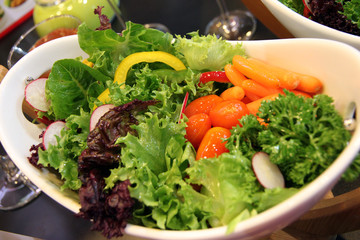 Salad put take it on dish.