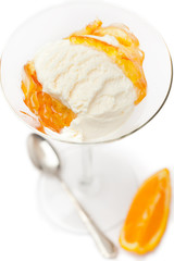Vanilla ice cream with marmalade on white