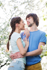 Fototapeta premium Young attractive couple together outdoors